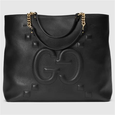 gucci embossed tote|gucci embossed clutch bag.